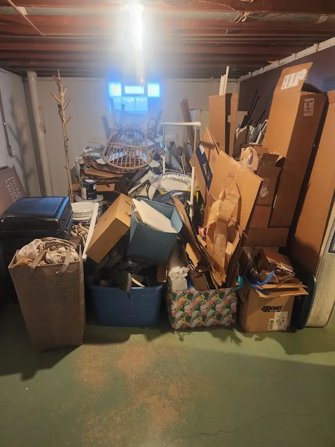 Roll-off dumpster container at job site for 20 Yard Dumpster Rental in Ava